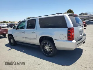 2013 Chevrolet Suburban LT with VIN 1GNSCJE09DR105725, listed as a Copart auction lot 61450935 with 171,659 mi miles and Salvage title. Bid and sale history available at DreamBid. Image 2.