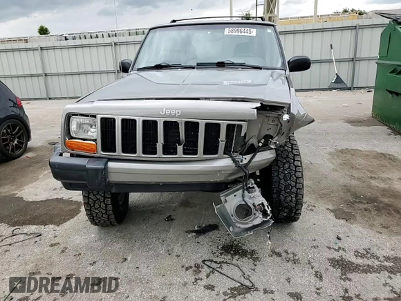2001 Jeep Cherokee Sport with VIN 1J4FF48S91L592966, listed as a Copart auction lot 58996445 with 159,140 mi miles and Salvage title. Bid and sale history available at DreamBid. Image 14.