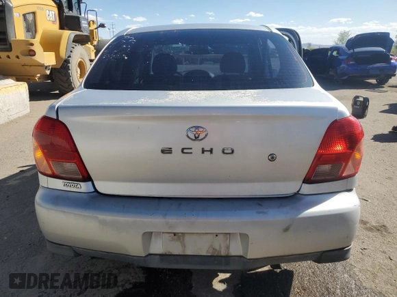 2001 Toyota ECHO z VIN JTDBT123110143148, wystawiony jako Copart lot #54260225 z przebiegiem 85 065 mil mil oraz Szkoda całkowita • Salvage title. Historia ofert i sprzedaży dostępna na DreamBid. Obrazek 6.