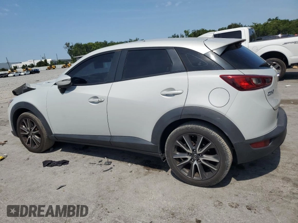 2017 Mazda CX-3 Touring z VIN JM1DKDC75H0168823, wystawiony jako Copart lot #57968955 z przebiegiem 116 231 mil mil oraz Szkoda całkowita • Salvage title. Historia ofert i sprzedaży dostępna na DreamBid. Obrazek 2.
