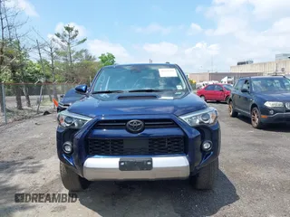 2022 Toyota 4Runner TRD Off Road Premium z VIN JTERU5JR7N6037617, wystawiony jako IAAI lot #42371339 z przebiegiem 35 601 mil mil oraz . Historia ofert i sprzedaży dostępna na DreamBid. Obrazek 13.