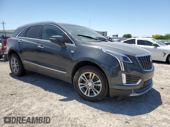 2023 Cadillac XT5 FWD Premium Luxury z VIN 1GYKNCRS0PZ173923, wystawiony jako Copart lot #52212695 z przebiegiem Nie podano mil oraz Szkoda całkowita • Salvage title. Historia ofert i sprzedaży dostępna na DreamBid. Obrazek 4.