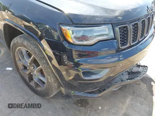 2021 Jeep Grand Cherokee Limited z VIN 1C4RJFBG4MC666557, wystawiony jako IAAI lot #42311088 z przebiegiem 126 808 mil mil oraz . Historia ofert i sprzedaży dostępna na DreamBid. Obrazek 19.