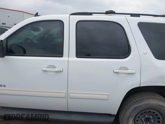 2011 Chevrolet Tahoe LT with VIN 1GNSCBE0XBR256687, listed as a IAAI auction lot 41948765 with 232,954 mi miles and . Bid and sale history available at DreamBid. Image 14.