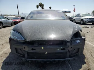 2018 Tesla Model S 75D с VIN 5YJSA1E24JF248762, выставлен на аукционе Copart как лот 61501075 с пробегом 63 802 миль миль и Списание • Salvage title. История ставок и продаж доступна на DreamBid. Изображение 5.