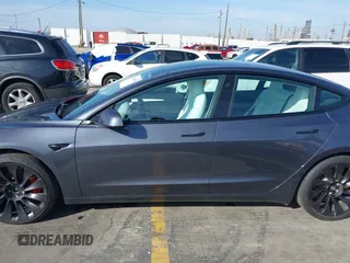 2023 Tesla Model 3 Performance with VIN 5YJ3E1EC4PF705449, listed as a IAAI auction lot 41587026 with 30,292 mi miles. Bid and sale history available at carsss.com. Image 15.