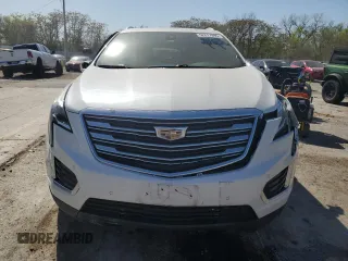 2018 Cadillac XT5 Premium Luxury FWD z VIN 1GYKNERS6JZ102163, wystawiony jako Copart lot #52817895 z przebiegiem 167 570 mil mil oraz Nie do naprawy. Historia ofert i sprzedaży dostępna na DreamBid. Obrazek 5.