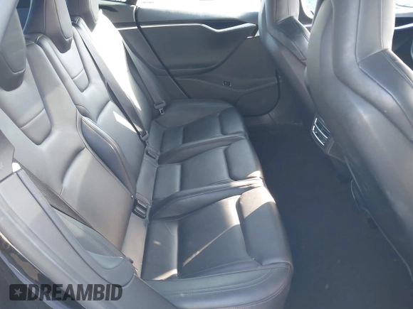 2014 Tesla Model S P85D with VIN 5YJSA1H22EFP65530, listed as a IAAI auction lot 41959941 with 76,532 mi miles and . Bid and sale history available at DreamBid. Image 8.