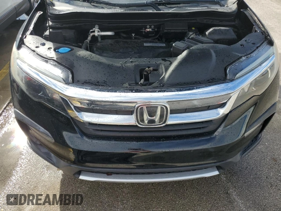 2020 Honda Pilot EX-L с VIN 5FNYF5H56LB005045, выставлен на аукционе Copart как лот 74056264 с пробегом Не указан миль и На запчасти • Non repairable. История ставок и продаж доступна на DreamBid. Изображение 12.
