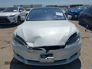 2017 Tesla Model S 100D with VIN 5YJSA1E20HF232570, listed as a IAAI auction lot 42037409 with 68,957 mi miles and . Bid and sale history available at DreamBid. Image 12.
