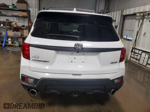 2023 Honda Passport EX-L z VIN 5FNYF8H59PB011459, wystawiony jako Copart lot #80345424 z przebiegiem 23 050 mil mil oraz Szkoda całkowita • Salvage title. Historia ofert i sprzedaży dostępna na DreamBid. Obrazek 6.