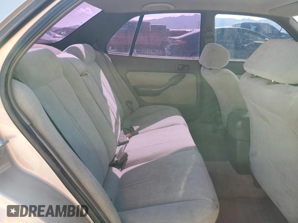 1993 Toyota Camry LE z VIN 4T1SK12E7PU287093, wystawiony jako Copart lot #55682275 z przebiegiem 110 399 mil mil oraz Szkoda całkowita • Salvage title. Historia ofert i sprzedaży dostępna na DreamBid. Obrazek 10.