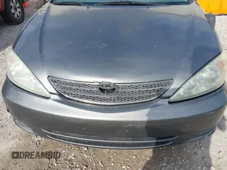 2003 Toyota Camry LE with VIN 4T1BE32K03U727447, listed as a IAAI auction lot 42118785 with 325,881 mi miles and . Bid and sale history available at DreamBid. Image 10.