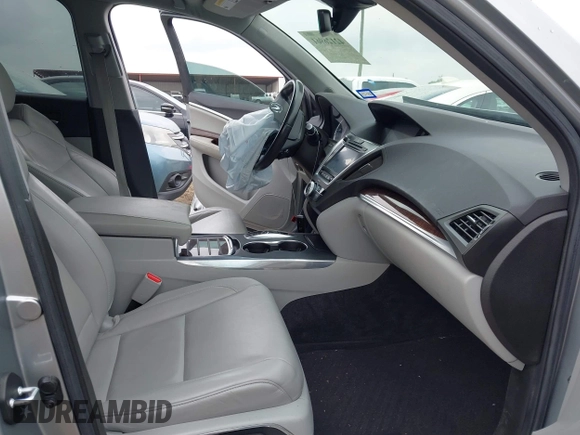 2020 Acura MDX with VIN 5J8YD3H32LL016504, listed as a IAAI auction lot 42126961 with 90,307 mi miles and . Bid and sale history available at DreamBid. Image 5.