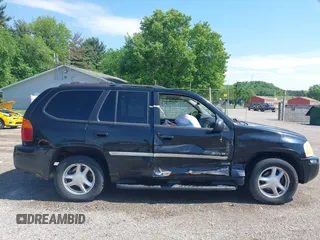 2006 GMC Envoy SLE z VIN 1GKDT13S862193382, wystawiony jako IAAI lot #42274946 z przebiegiem 187 379 mil mil oraz . Historia ofert i sprzedaży dostępna na DreamBid. Obrazek 13.