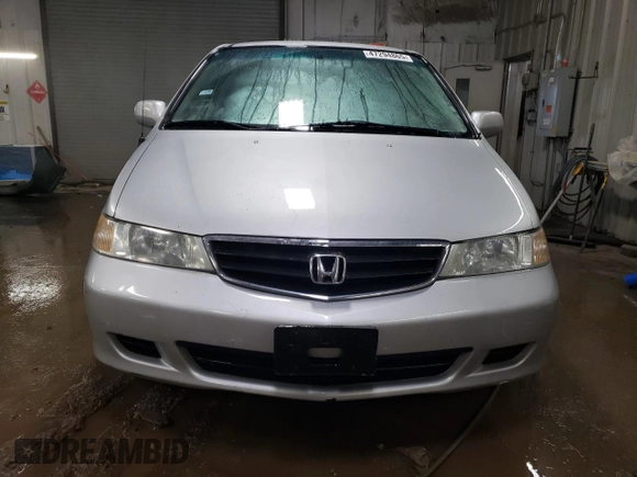 2004 Honda Odyssey EX-L with VIN 5FNRL189X4B098131, listed as a Copart auction lot 47294865 with 196,581 mi miles and Salvage Title. Bid and sale history available at DreamBid. Image 5.