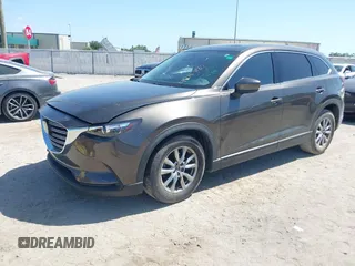 2019 Mazda CX-9 Touring with VIN JM3TCACY9K0304899, listed as a IAAI auction lot 42167180 with 57,043 mi miles and . Bid and sale history available at DreamBid. Image 17.