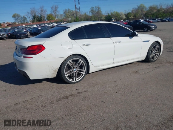 2016 BMW 6 Series 640i xDrive with VIN WBA6D2C51GGT66209, listed as a IAAI auction lot 42064405 with 113,500 mi miles and . Bid and sale history available at carsss.com. Image 4.