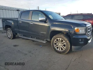 2015 GMC Canyon 4WD SLT z VIN 1GTG6CE34F1121540, wystawiony jako Copart lot #86190774 z przebiegiem 141 381 mil mil oraz Czysty tytuł • Clean title. Historia ofert i sprzedaży dostępna na DreamBid. Obrazek 4.