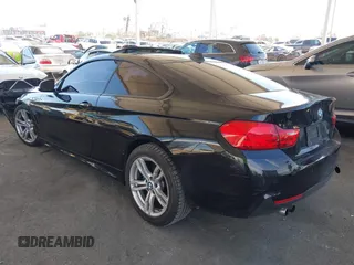 2014 BMW 4 Series 428i with VIN WBA3N7C51EK220125, listed as a IAAI auction lot 41881928 with 129,810 mi miles and . Bid and sale history available at carsss.com. Image 3.
