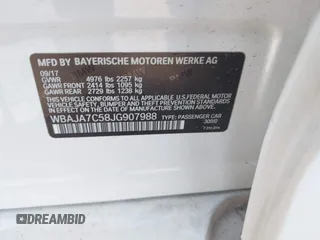 2018 BMW 5 Series 530i xDrive with VIN WBAJA7C58JG907988, listed as a IAAI auction lot 38011708 with Not provided miles and . Bid and sale history available at DreamBid. Image 9.