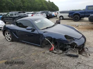 2006 Porsche Cayman S с VIN WP0AB298X6U781940, выставлен на аукционе Copart как лот 70092204 с пробегом 116 506 миль миль и Списание • Salvage title. История ставок и продаж доступна на DreamBid. Изображение 4.
