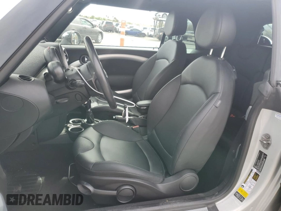 2014 MINI Convertible S with VIN WMWZP3C53ET707205, listed as a Copart auction lot 52179175 with 101,209 mi miles and Salvage Title. Bid and sale history available at DreamBid. Image 7.