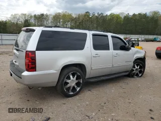 2014 Chevrolet Suburban LT z VIN 1GNSCJE00ER157634, wystawiony jako Copart lot #53271405 z przebiegiem 244 830 mil mil oraz Czysty tytuł • Clean title. Historia ofert i sprzedaży dostępna na DreamBid. Obrazek 3.