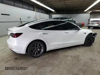 2021 Tesla Model 3 Standard Range Plus z VIN 5YJ3E1EA4MF943036, wystawiony jako Copart lot #54008355 z przebiegiem 62 981 mil mil oraz Szkoda całkowita • Salvage title. Historia ofert i sprzedaży dostępna na DreamBid. Obrazek 3.