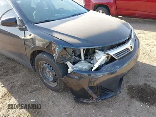 2014 Toyota Camry L with VIN 4T4BF1FK9ER363906, listed as a IAAI auction lot 41850751 with 207,368 mi miles and . Bid and sale history available at DreamBid. Image 6.