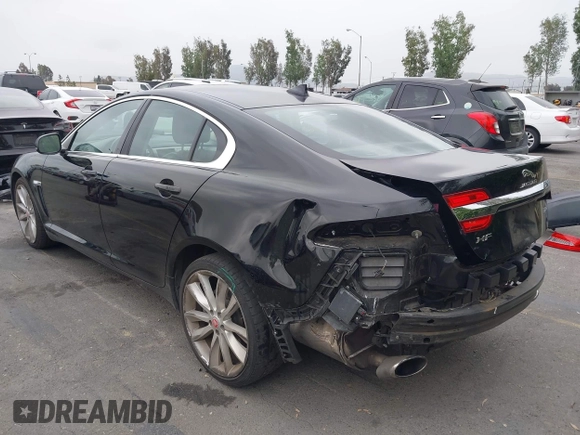 2015 Jaguar XF V6 Portfolio with VIN SAJWA0F77F8U65737, listed as a IAAI auction lot 42078529 with 62,229 mi miles. Bid and sale history available at carsss.com. Image 3.