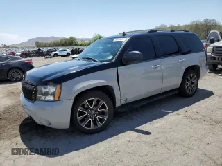 2007 Chevrolet Tahoe LTZ with VIN 1GNFC13057R245442, listed as a Copart auction lot 60250235 with 241,441 mi miles and Salvage title. Bid and sale history available at DreamBid. Image 1.