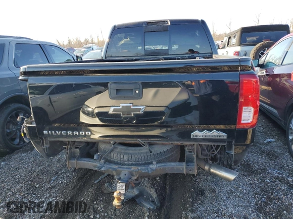 2016 Chevrolet Silverado 1500 High Country with VIN 3GCUKTEC4GG149954, listed as a Copart auction lot 82769224 with 130,820 mi miles and Salvage Title. Bid and sale history available at DreamBid. Image 6.