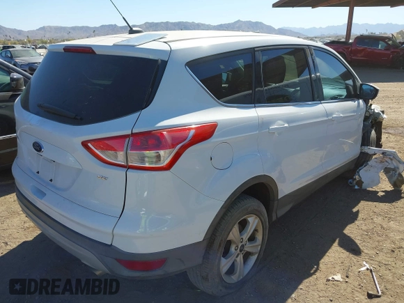 2015 Ford Escape SE with VIN 1FMCU0G7XFUA52818, listed as a IAAI auction lot 41679303 with 127,098 mi miles. Bid and sale history available at carsss.com. Image 4.