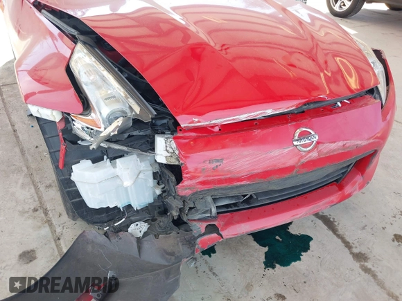 2016 Nissan 370Z with VIN JN1AZ4EH6GM931396, listed as a IAAI auction lot 42034122 with 16,477 mi miles. Bid and sale history available at carsss.com. Image 6.