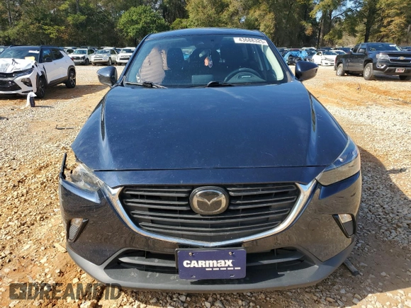 2021 Mazda CX-3 Sport with VIN JM1DKDB78M1515924, listed as a Copart auction lot 43688325 with 56,271 mi miles and Salvage Title. Bid and sale history available at carsss.com. Image 5.