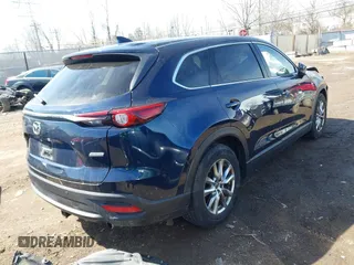 2017 Mazda CX-9 Touring with VIN JM3TCBCY3H0139866, listed as a IAAI auction lot 41849281 with 135,259 mi miles and . Bid and sale history available at DreamBid. Image 4.