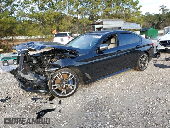 2020 BMW 5 Series M550i xDrive with VIN WBAJS7C01LCD23365, listed as a Copart auction lot 88302885 with Not provided miles and Salvage title. Bid and sale history available at DreamBid. Image 1.