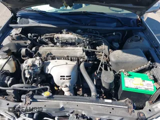 1998 Toyota Camry LE z VIN 4T1BG28KXWU248887, wystawiony jako IAAI lot #41507392 z przebiegiem Nie podano mil oraz . Historia ofert i sprzedaży dostępna na DreamBid. Obrazek 10.