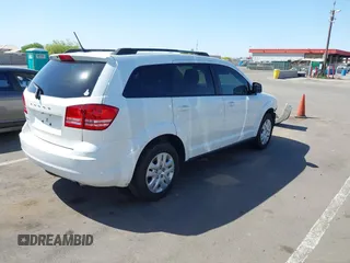 2018 Dodge Journey SE with VIN 3C4PDCAB0JT229335, listed as a IAAI auction lot 42056228 with 157,868 mi miles. Bid and sale history available at carsss.com. Image 4.