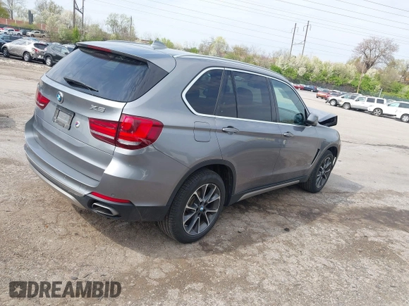 2018 BMW X5 xDrive35i with VIN 5UXKR0C51J0X95114, listed as a IAAI auction lot 42037253 with 80,095 mi miles. Bid and sale history available at carsss.com. Image 4.