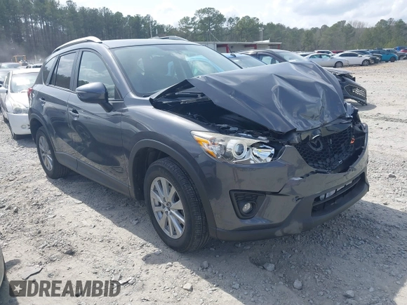 2015 Mazda CX-5 Touring with VIN JM3KE2CY2F0530204, listed as a IAAI auction lot 41788921 with 50,827 mi miles. Bid and sale history available at carsss.com. Image 1.