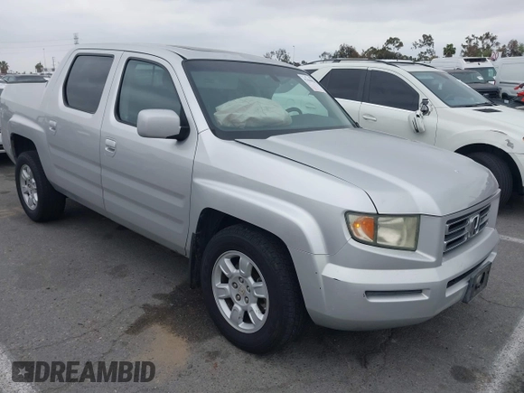 2006 Honda Ridgeline RTL with VIN 2HJYK16566H532598, listed as a IAAI auction lot 42184828 with 91,817 mi miles and . Bid and sale history available at DreamBid. Image 1.