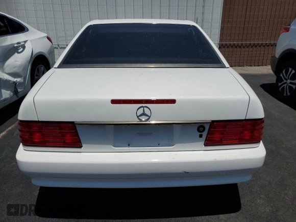 1994 Mercedes-Benz SL z VIN WDBFA63EXRF097007, wystawiony jako Copart lot #59714045 z przebiegiem Nie podano mil oraz Szkoda całkowita • Salvage title. Historia ofert i sprzedaży dostępna na DreamBid. Obrazek 6.