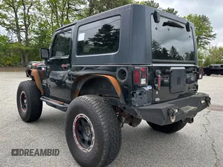 2008 Jeep Wrangler X with VIN 1J4FA24168L582227, listed as a Copart auction lot 58219065 with 98,284 mi miles and Salvage title. Bid and sale history available at DreamBid. Image 3.