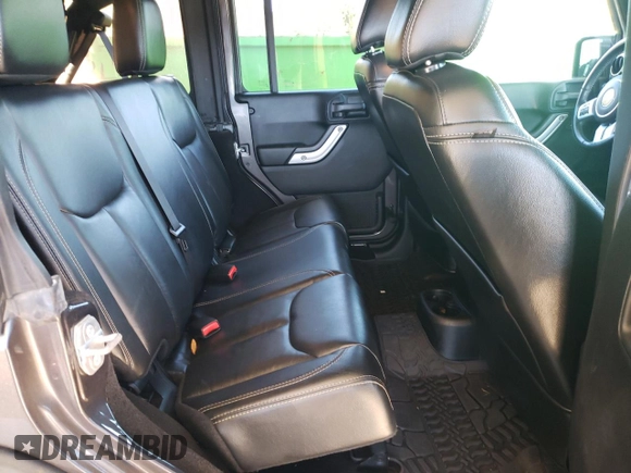 2016 Jeep Wrangler Unlimited Rubicon Hard Rock with VIN 1C4HJWFG7GL239318, listed as a Copart auction lot 76356734 with 121,442 mi miles and Salvage Title. Bid and sale history available at carsss.com. Image 10.