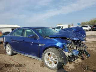 2014 Ford Taurus SEL z VIN 1FAHP2E88EG174797, wystawiony jako Copart lot #53961615 z przebiegiem Nie podano mil oraz Szkody całkowita. Historia ofert i sprzedaży dostępna na DreamBid. Obrazek 4.