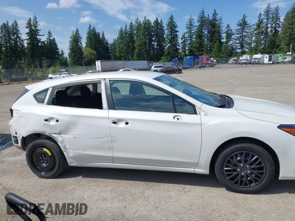 2019 Subaru Impreza with VIN 4S3GTAA63K3733496, listed as a IAAI auction lot 42500553 with 65,708 mi miles and . Bid and sale history available at DreamBid. Image 14.