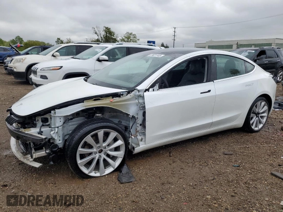 2020 Tesla Model 3 Long Range z VIN 5YJ3E1EB3LF667522, wystawiony jako Copart lot #57421145 z przebiegiem 77 821 mil mil oraz Szkoda całkowita • Salvage title. Historia ofert i sprzedaży dostępna na DreamBid. Obrazek 1.