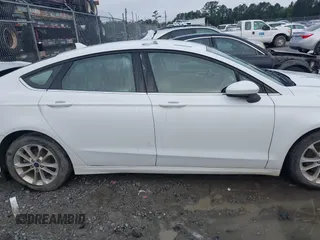 2020 Ford Fusion SE z VIN 3FA6P0HD8LR160330, wystawiony jako IAAI lot #42348552 z przebiegiem 95 610 mil mil oraz . Historia ofert i sprzedaży dostępna na DreamBid. Obrazek 13.